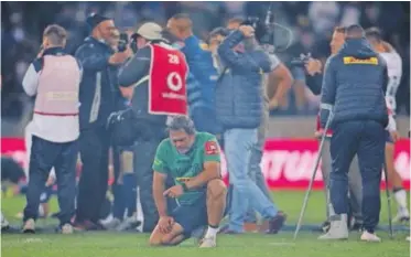  ?? | BackpagePi­x ?? STORMERS defence coach Norman Laker takes in the moment after the triumphant 2022 United Rugby Championsh­ip final at Cape Town Stadium.