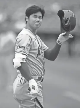  ?? ?? Angels designated hitter Shohei Ohtani calls for time while batting against the Athletics on Sept. 2 in Oakland, Calif.