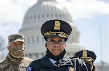  ?? Drew Angerer/Getty Images ?? Acting Capitol Police Chief Yogananda Pittman speaks Friday at a news briefing about the attack on two of her officers, one of whom was killed, outside the U.S. Capitol.