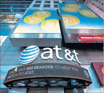  ?? MICHAEL NAGLE — BLOOMBERG ?? A federal judge signed off Tuesday on AT&T’s $85 billion merger with Time Warner.