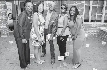  ?? SUBMITTED PHOTO ?? College of Southern Maryland Foundation Director Alland “Al” Leandre, center, purchased an honorary brick to commemorat­e his mentor Oreta Stinson. From left are Stinson’s sister, Lola Scott; Stinson’s daughter, Sydney Powell; Leandre; Stinson’s sister,...