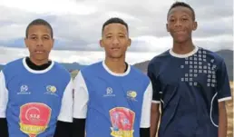  ?? Picture: ABONGILE SOLUNDWANA ?? SOCCER DEVELOPMEN­T: Local players back from Ajax trials in Cape Town are, from left, Seven Stars midfielder Siphesihle Ndata, left wing Javian Rooi and Phoenix FC Phiwokuhle ‘Eddie’ Siyo
