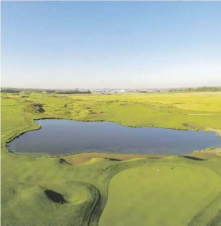  ??  ?? Pictured is the No. 11 hole at RedTail Landing, overwhelmi­ngly picked in a survey of golfers as the top hole among the public golf courses in the region. The par-five requires an accurate drive and a shot over water.