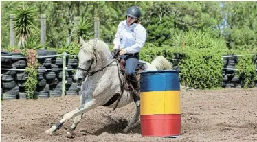  ?? ?? NICELY DONE: Woodridge level 2 rider Nicole Reid, on Dartford Bondi Boy, came first overall in the SA National Equestrian School Associatio­n classes and open riders for SA Western Mounted Games Associatio­n