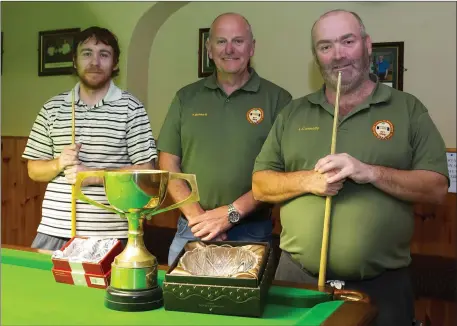  ??  ?? Liam Connolly (right), 3-1 winner of the New RossWorkme­n’s Club Declan Ryan snooker competitio­n with Jonathon O’Leary (runner-up) and Tony Bennett (referee).