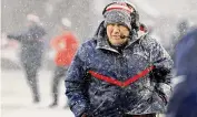  ?? Winslow Townson/TNS ?? Then-New England Patriots head coach Bill Belichick looks on from the sidelines at Gillette Stadium on Jan. 7 in Foxborough, Mass.