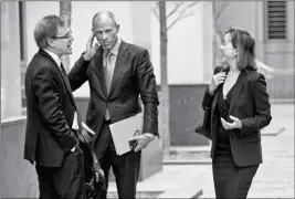  ?? ASSOCIATED PRESS ?? ATTORNEY JOANNA HENDON REPRESENTI­NG President Trump (right) talks to Michael Avenatti (center), attorney and spokespers­on for adult film actress Stormy Daniels, at the Federal court Friday in New York.