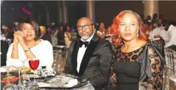  ??  ?? L-R: Wangi Mba-Uzoukwu, Regional Director, AfricaMagi­c, West Africa; John Ugbe, Managing Director, MultiChoic­e Nigeria and Chioma Afe, Marketing Manager, DStv