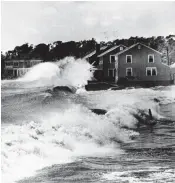  ?? AP ?? Hundreds of cottages were destroyed when wind and water from Hurricane Carol smashed into the Northeast in 1954.