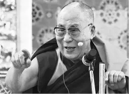  ?? PHOTO: REUTER ?? The Dalai Lama addresses a gathering at the Thupsung Dhargyelin­g Monastery in Dirang, Arunachal Pradesh, on April 6