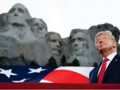  ?? (AFP via Getty) ?? Donald Trump stands in front of Mount Rushmore