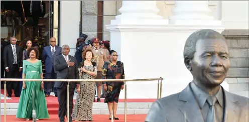  ?? JAIRUS MMUTLE GCIS ?? President Cyril Ramaphosa, flanked by National Speaker Baleka Mbete, First Lady Dr Tshepo Motsepe and National Council of Provinces Chairperso­n Thandi Modise on the steps of the National Assembly ahead of the State of the Nation Address yesterday. |