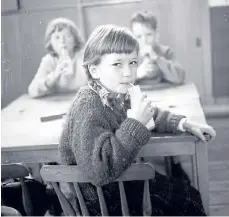  ??  ?? Milk time for Brenda Sudding at Stuartfiel­d School