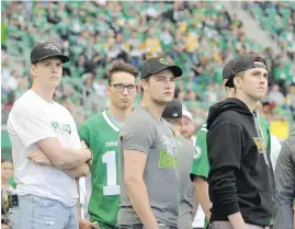  ??  ?? Survivors of the Humboldt Broncos team bus crash in April are honoured at Saturday’s Canadian Football League game in Regina.