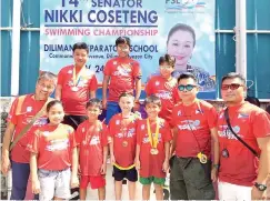  ??  ?? The gold medal winners pose for a photo with coaches Alex Papa, Marlon Dula and Luisito Luistro during the awarding ceremonies of the 153rd Philippine Swimming League (PSL) National Series.