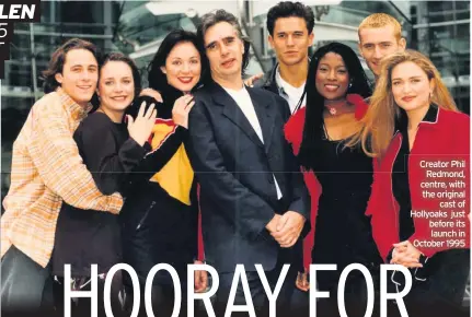  ??  ?? Creator Phil Redmond, centre, with the original cast of Hollyoaks just before its launch in October 1995