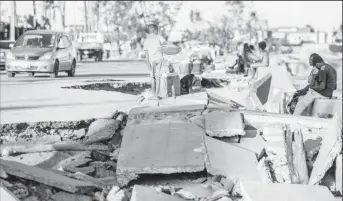  ?? ?? Climate change impact in Mozambique's Beira city which was hit by cyclone Idai in 2019, leaving extensive loss and damage to the city's infrastruc­ture, including roads. Copyright: World Bank photo collection, (CC BY-NC-ND 2.0)