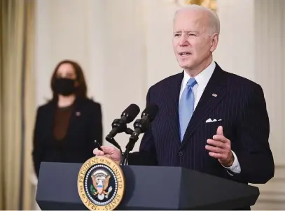  ?? Picture: AFP ?? TOP LEVEL. US President Joe Biden delivers remarks on the government’s pandemic response, including the recently announced partnershi­p between Johnson & Johnson and Merck to produce more Johnson & Johnson vaccine, as US Vice-President Kamala Harris looks on at the White House in Washington, DC, on Tuesday.