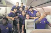  ?? FACEBOOK ?? Barcelona players on board their flight to the US.