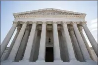  ?? The Associated Press ?? HIGH COURT: The U.S. Supreme Court is seen Tuesday in Washington.