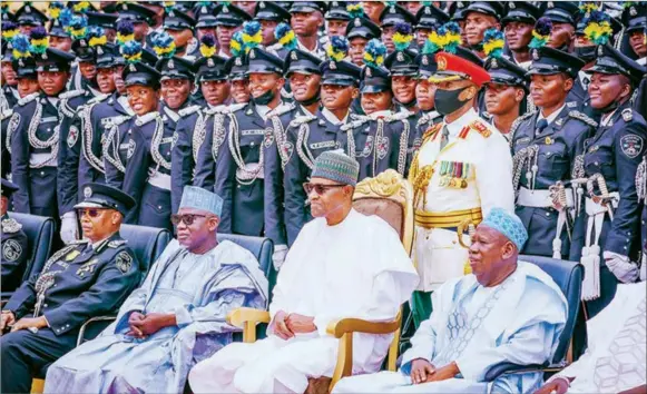  ?? PHOTO: PHILIP OJISUA ?? Kano State Governor Abdullahi Ganduje ( right); President Muhammadu Buhari; Minister of Police Affairs, Muhammad Digyadi and IG of Police, Usman Alkali Baba at the graduation ceremony/ passing out parade of police cadets at Police Academy, Wudil in Kano State… yesterday.