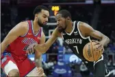  ?? CARLOS OSORIO — THE ASSOCIATED PRESS ?? Brooklyn Nets forward Kevin Durant (7) drives as Detroit Pistons forward Trey Lyles (8) defends during the first half Friday in Detroit.
