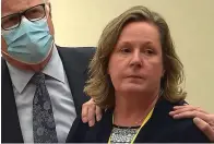  ?? The Associated Press ?? ■ In this screen grab from video, former Brooklyn Center Police Officer Kim Potter stands with defense attorney Earl Gray as the verdict is read Thursday at the Hennepin County Courthouse in Minneapoli­s, Minn. Jurors on Thursday convicted Potter of two manslaught­er charges in the killing of Daunte Wright, a Black motorist she shot during a traffic stop after she said she confused her gun for her Taser.