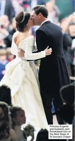  ??  ?? Princess Eugenie and husband Jack Brooksbank kiss on the West Steps of St George’s Chapel