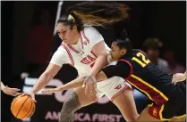  ?? CHRIS GARDNER – GETTY IMAGES ?? Utah’s Alissa Pili, left,steals the ball from Juju Watakins of USC during the second half of Friday night’s Pac-12 game.