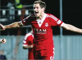  ??  ?? ROLLING BACK THE YEARS: Striker Scott Vernon in action for Aberdeen