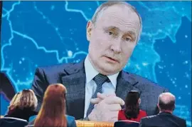  ?? NATALIA KOLESNIKOV­A AFP/ Getty I mages ?? U. S. RETALIATIO­N for the cyberattac­ks on federal agencies could include exposing corruption in the government of Russian President Vladimir Putin.