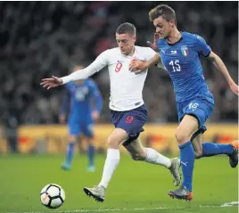  ??  ?? England’s Jamie Vardy (left) and Italy’s Daniele Rugani battle for the ball during the internatio­nal friendly match at Wembley Stadium. Nick Potts/PA Wire.