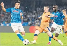  ?? ?? Ryan Kent is crowded out during the defeat in Naples