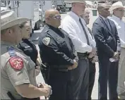  ?? DARIO LOPEZ-MILLS Associated Press ?? CHIEF Pete Arredondo, third from left, has been criticized for his handling of the May 24 massacre.