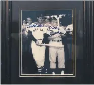  ?? COURTESY AARON’S ESTATE SALES ?? An autographe­d photo of Ted Williams and Mickey Mantle is one of thousands of items to be sold at the estate sale of Denny McLain, Oct.2-4, in Wixom.