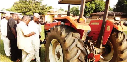  ??  ?? The Chairman of Abaji Area Council, Alhaji Abdulrahma­n Ajiya, inspects one of the refurbishe­d tractors in the council recently.