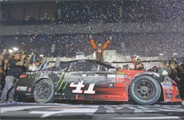  ?? The Associated Press ?? Kurt Busch celebrates in Victory Lane after winning the NASCAR Daytona 500 race at Daytona Internatio­nal Speedway in Daytona Beach, Fla., on Sunday.