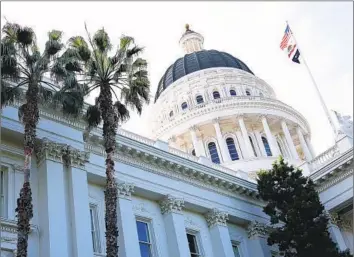  ?? Arturo Holmes Getty Images for National Urban League ?? GOV. GAVIN NEWSOM and Democratic lawmakers are considerin­g significan­t cuts to some initiative­s they recently helped launch while promising to “protect our progress.” Pictured is the state Capitol building.