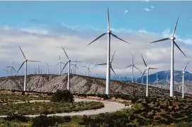  ?? Ashley Landis/Associated Press file photo ?? Wind turbines operate on March 7 in Palm Springs, Calif. According to a new report published Tuesday, last year, marked the best year for new wind projects.