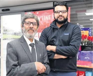  ??  ?? Making a difference
Shopkeeper Manzoor Ahmad with son Irfan Ali Ahmed