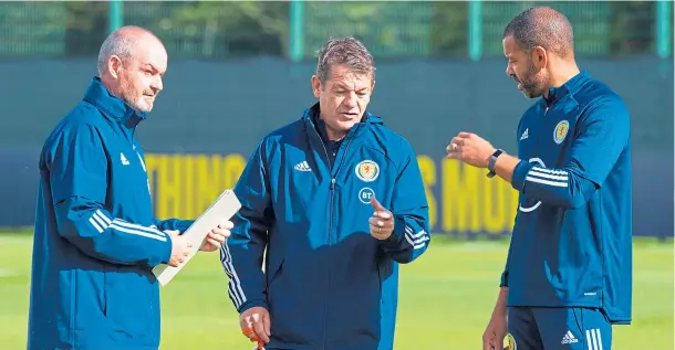  ??  ?? A LOT OF HOMEWORK: Manager Steve Clarke and his coaches John Carver, centre, and Steven Reid have had to study up on Czech Republic’s second-string squad
