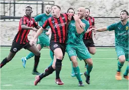  ?? ?? Rory Wagner tangles with his South Springvale opponent at United’s home game.