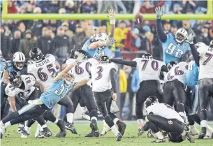  ?? WADE PAYNE THE ASSOCIATED PRESS FILE PHOTO ?? Raven Matt Stover kicks a field goal with 53 seconds left to beat Tennessee on Jan. 10, 2009.