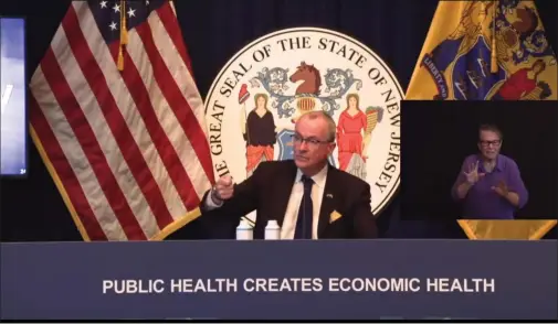  ?? ASSOCIATED PRESS ?? Gov. Phil Murphy during Monday’s COVID press conference, in which a question from a News 12reporter resulted in an ongoing battle to a simple question: How many new COVID cases are in New Jersey?