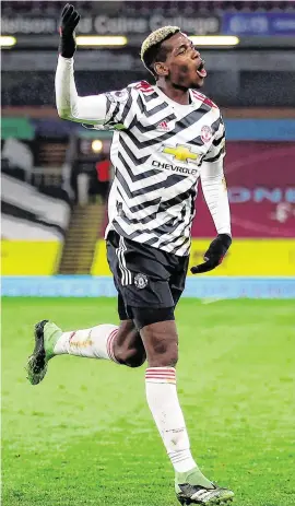  ??  ?? Paul Pogba celebrates after scoring the winner in Manchester United’s 1-0 success at Burnley, a result that moves Ole Gunnar Solskjaer’s side top of the Premier League ahead of Sunday’s trip to Liverpool