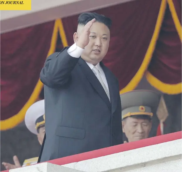  ?? WONG MAYE-E / THE ASSOCIATED PRESS FILES ?? North Korean leader Kim Jong Un waves during a military parade in Pyongyang, North Korea, in April. The rogue northeast Asian country has reacted strongly against tough new UN sanctions, vowing to continue weapons tests that it says could be used to...