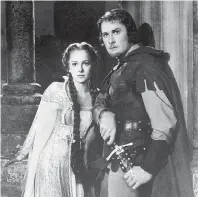  ??  ?? Errol Flynn with Olivia de Havilland in The Adventures of Robin Hood, one of the swashbuckl­ers that made him a star.