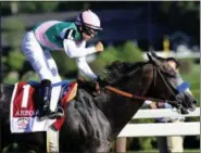  ?? HANS PENNINK - THE ASSOCITATE­D PRESS ?? In this Aug. 27 photo, Jockey Mike Smith celebrates aboard Arrogate after winning the Travers Stakes horse race at Saratoga Race Course. Smith is poised for another lucrative weekend in the Breeders’ Cup at Santa Anita with mounts in the $2 million...