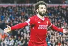  ??  ?? MEDIA LIMITED/REX/SHUTTERSTO­CK Mohamed Salah celebrates a goal for Liverpool.