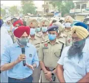  ?? HT PHOTOS ?? Victims Amandeep Singh, alias Aman Fauji (left), and Prabhjit Singh.; and (above) SP investigat­ion Jagjit Singh Walia urging protesters to lift dharna in Patti on Thursday.